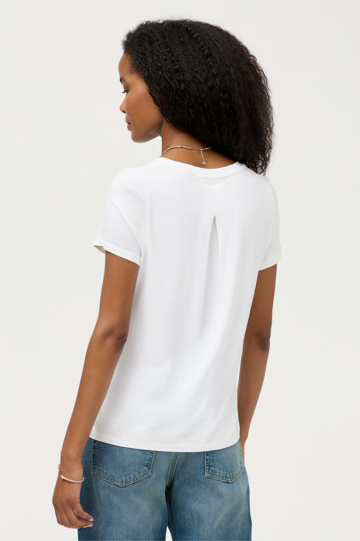 ESSENTIALS SHORT SLEEVE PLEAT BACK CREW NECK - Johnny Was Best Seller
